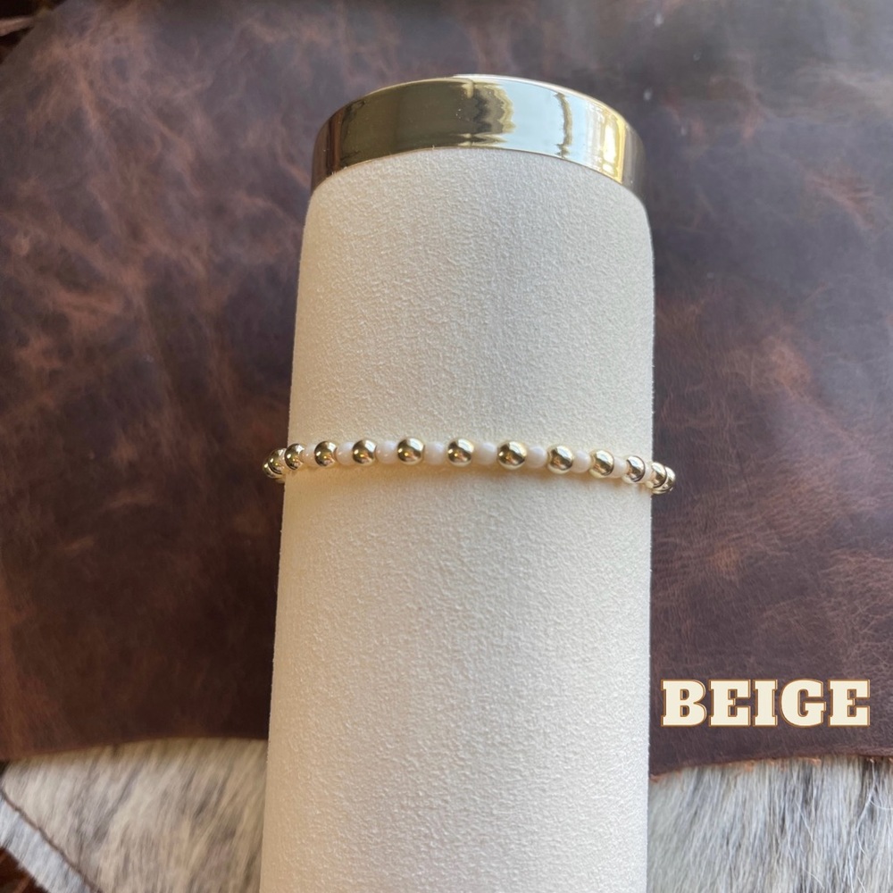 Beige and 14kt gold filled beaded bracelet